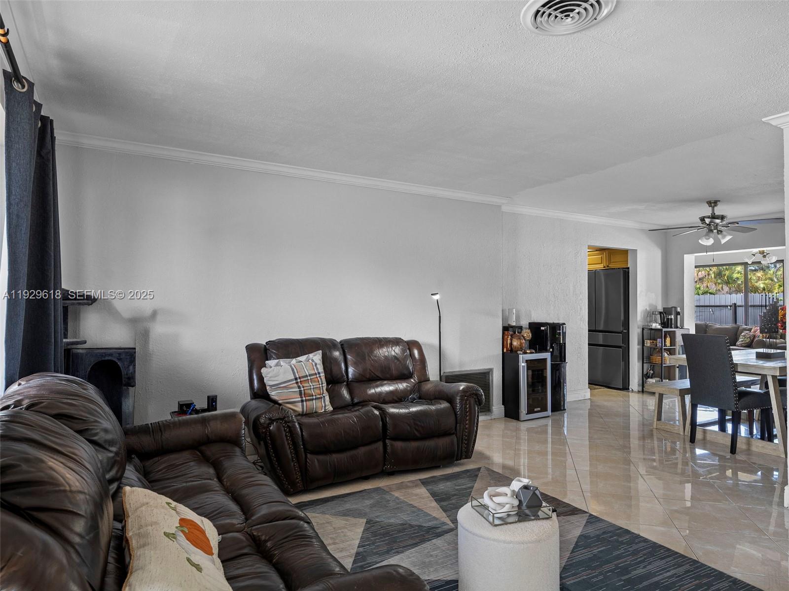 4461 Northwest 6th Street Plantation, FL 33317 - Photo 10 of 30 a living room with furniture and wooden floor