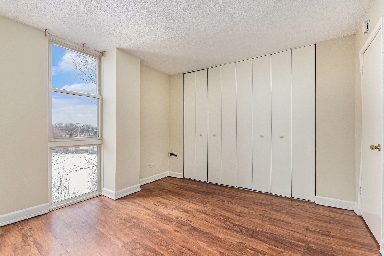 1043 South York Road, Unit 202 Bensenville, IL 60106 - Photo 14 of 19 a view of empty room with wooden floor