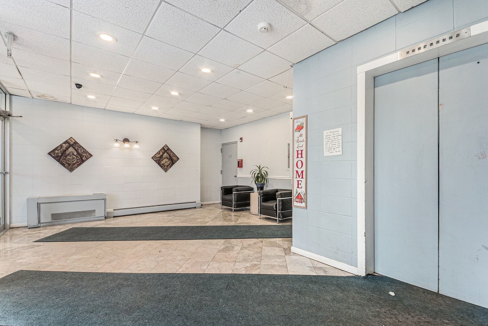 1043 South York Road, Unit 202 Bensenville, IL 60106 - Photo 3 of 19 a view of a living room