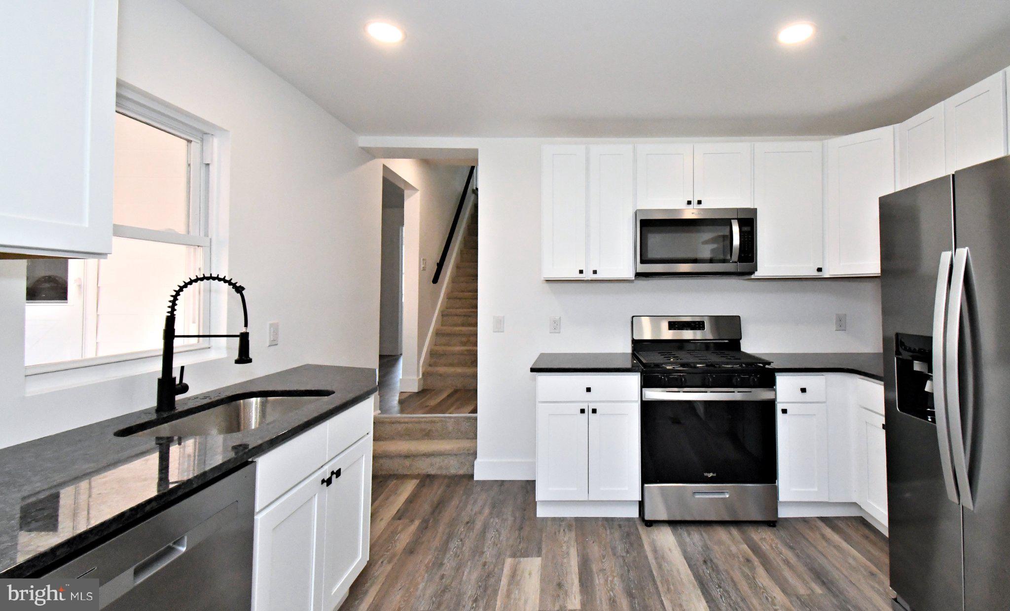 64 North Main Street Spring City, PA 19475 - Photo 2 of 26 Modern kitchen with sleek finishes.