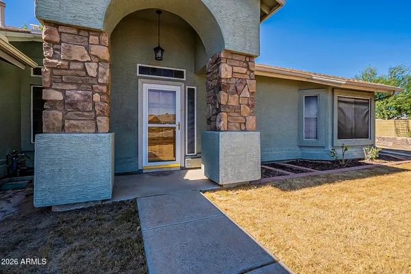a front view of a house with yard