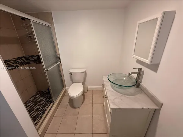 a bathroom with a sink and a toilet