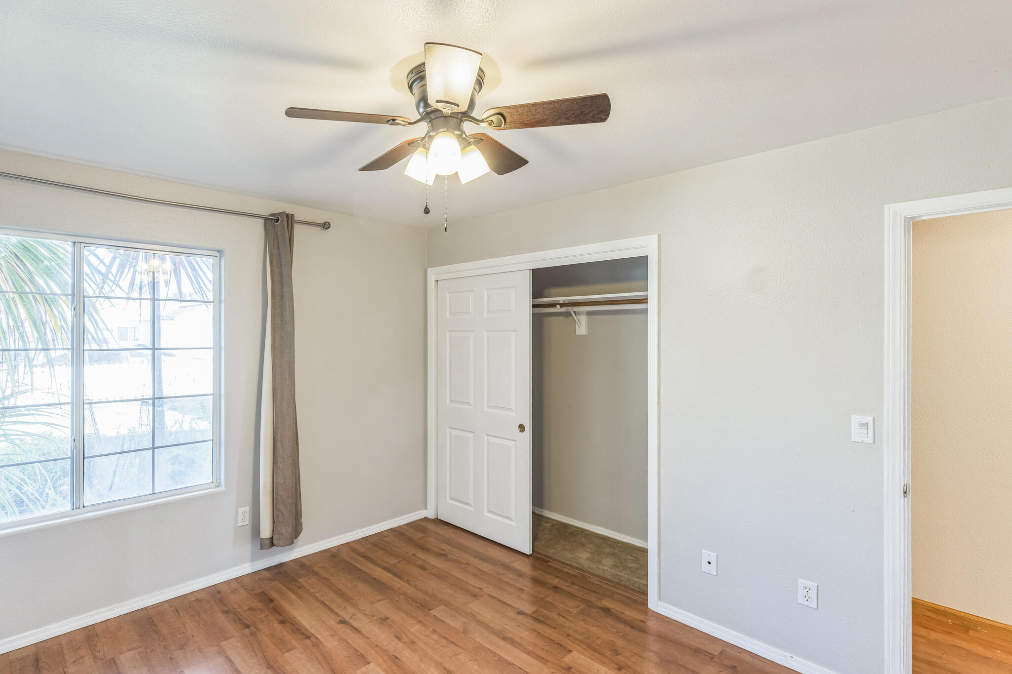 5146 Turnstone Circle Guadalupe, CA 93434 - Photo 10 of 21 wooden floor in an empty room with a window