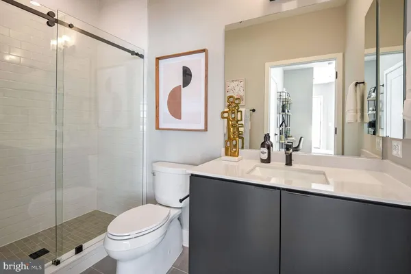 a view of a storage & utility room with a window