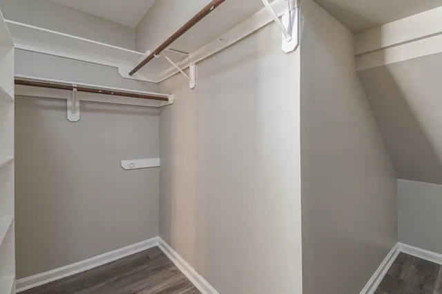 a view of an empty walk in closet