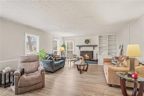 a bathroom with a sink mirror vanity and toilet