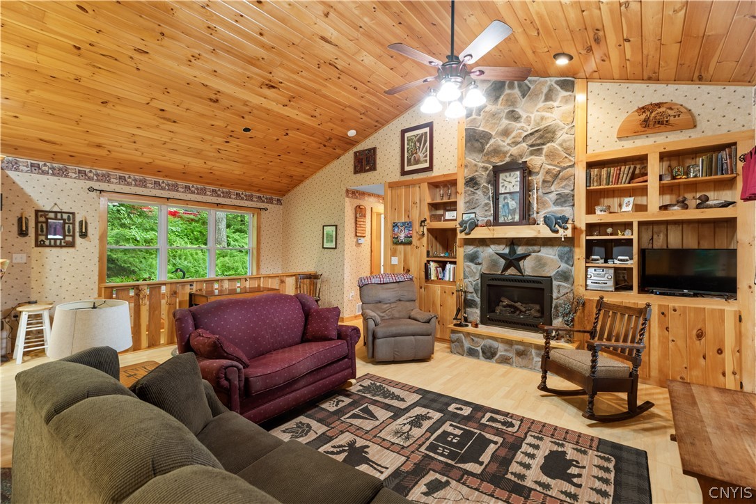 331 Pardee Road Russia, NY 13438 - Photo 7 of 31 Gas Fireplace Surrounded by Built in Cabinetry