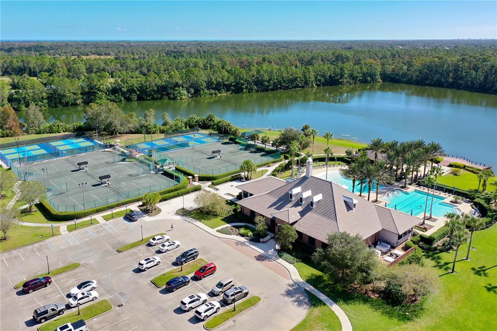 426 Long Cove Road Ormond Beach, FL 32174 - Photo 34 of 73 an aerial view of a house with garden space and lake view