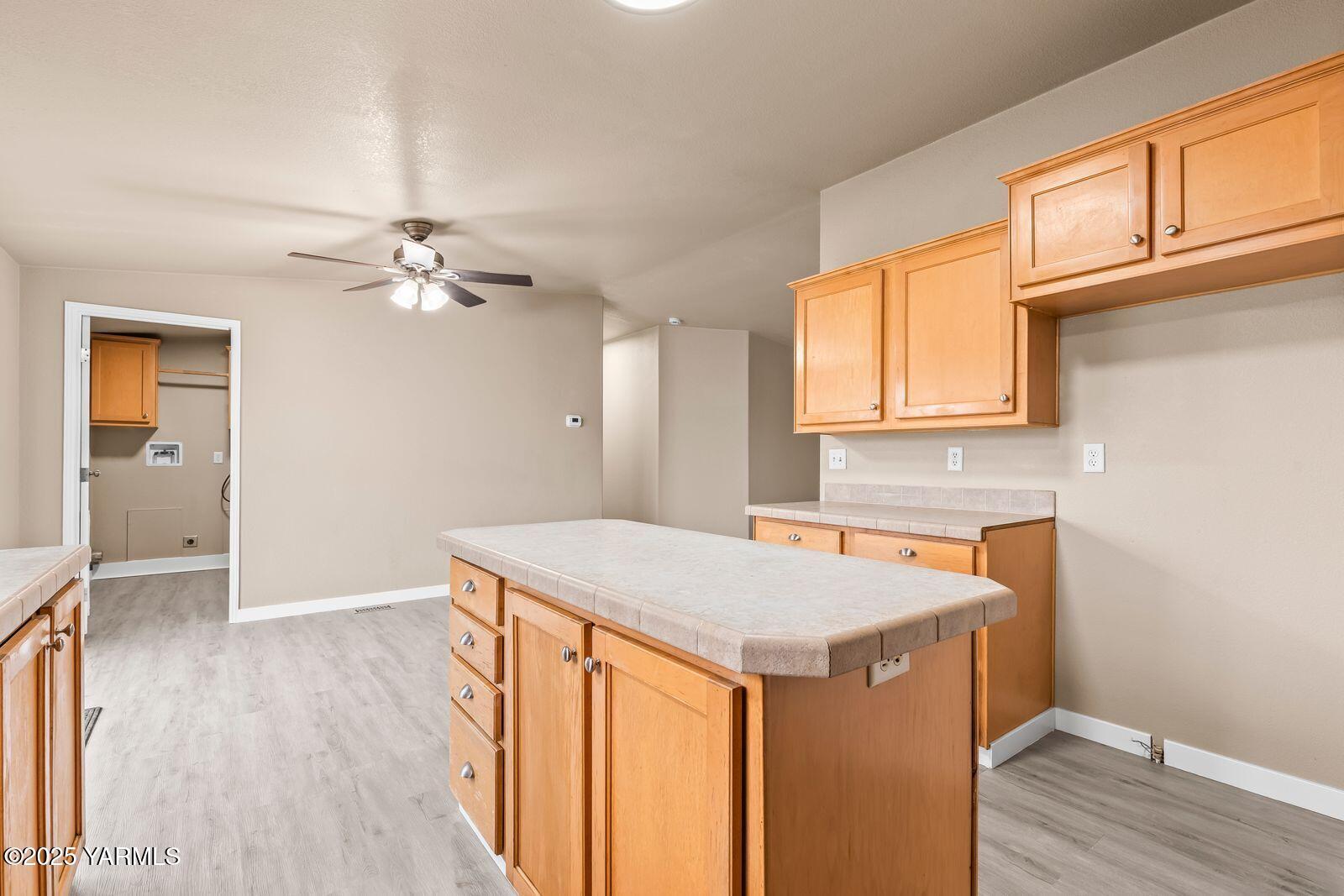 1023 Gibson Road Selah, WA 98942 - Photo 11 of 39 wooden floor in an empty room with a window