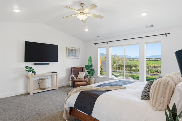 1422 West 3410th Street South Logan, UT 84321 - Photo 13 of 33 Vaulted ceiling room featuring a ceiling fan with integrated lighting, recessed lighting, and grey carpeting