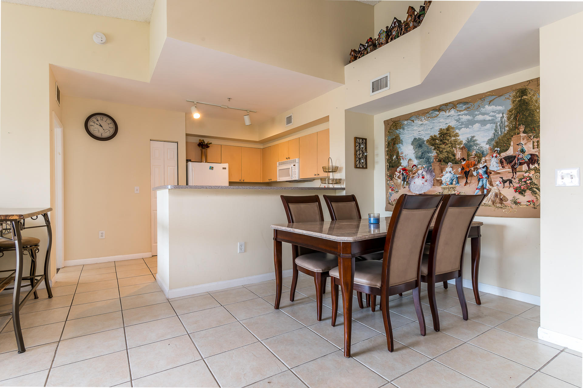 7980 North Nob Hill Road, Unit 303 Tamarac, FL 33321 - Photo 1 of 19 LIVING ROOM