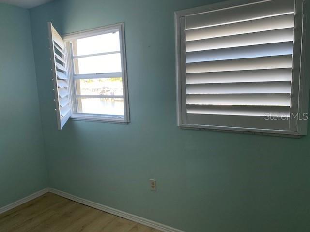 1 Boca Ciega Point Boulevard, Unit 213 St. Petersburg, FL 33708 - Photo 18 of 33 a small space with a window