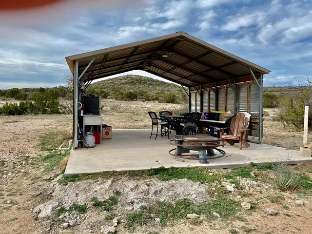 a view of sitting area with furniture and backyard