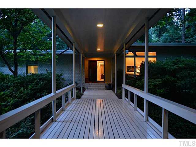 3700 Swann Street Raleigh, NC 27612 - Photo 1 of 20 Feel your stress level decrease as you cross the redwood bridge into your private oasis inside the beltline.