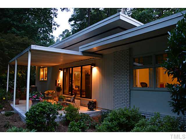 3700 Swann Street Raleigh, NC 27612 - Photo 19 of 20 Architect Don Statham created a timeless classic with interesting roof lines and took advantage of the lot to maximize privacy.