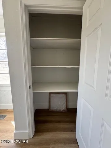 a view of open space with yard