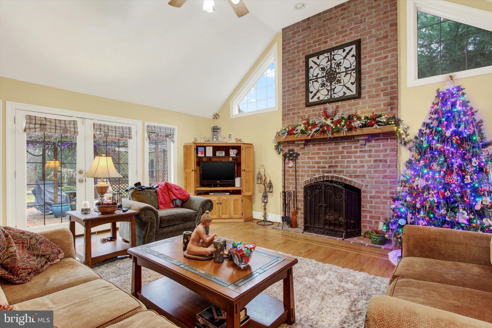 3504 Eagle Ridge Court Hanover, PA 17331 - Photo 13 of 59 Family room leading to patio through glass atrium