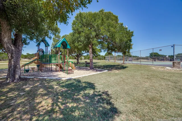 a view of a lake with a building in the background