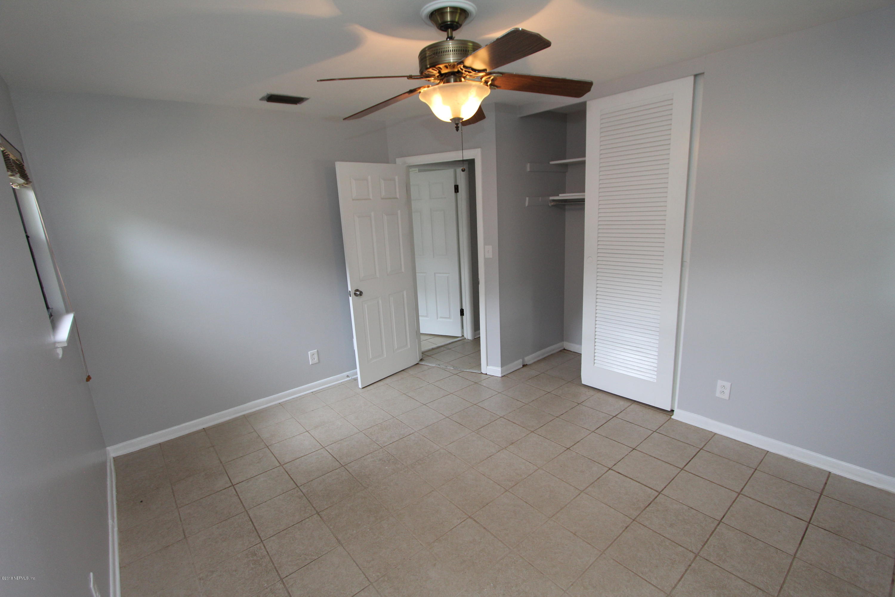 10610 Dodd Road Jacksonville, FL 32218 - Photo 16 of 24 a view of an empty room