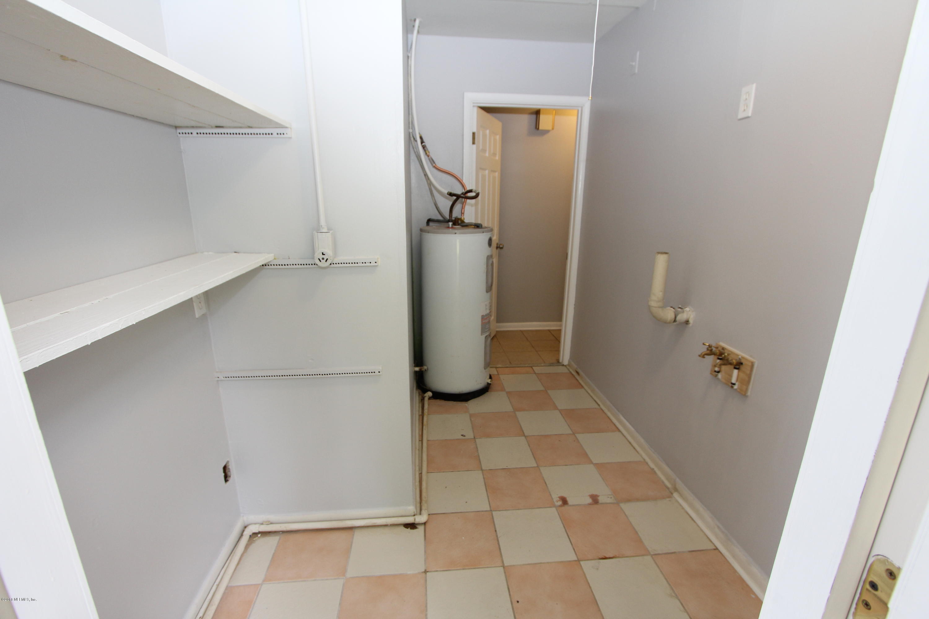 10610 Dodd Road Jacksonville, FL 32218 - Photo 17 of 24 a view of water heater room
