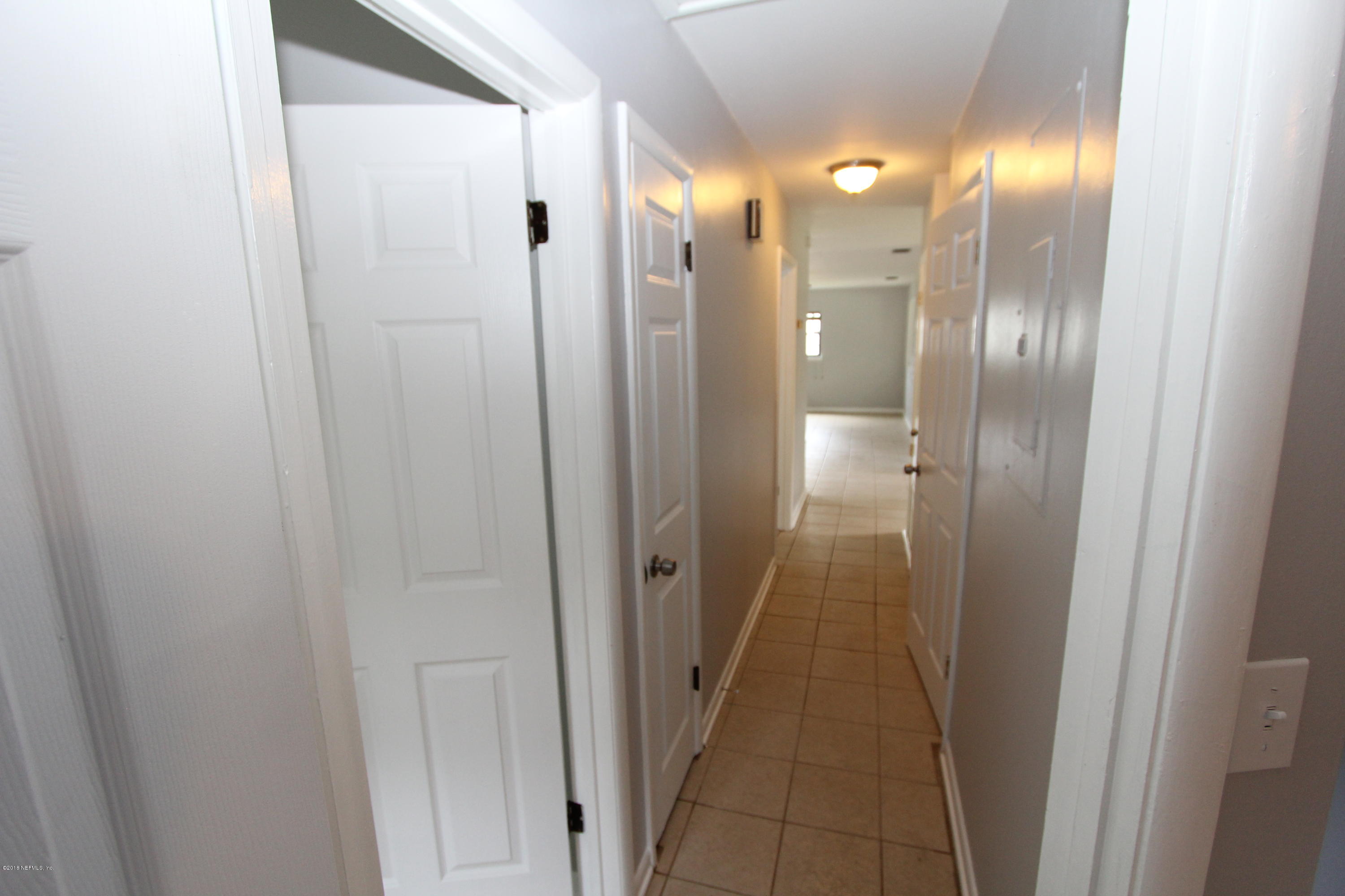 10610 Dodd Road Jacksonville, FL 32218 - Photo 23 of 24 a view of a hallway