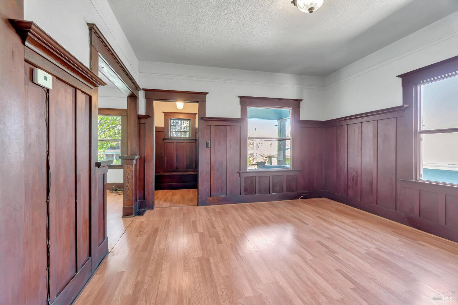 7 Bayview Street San Rafael, CA 94901 - Photo 11 of 79 wooden floor in an empty room with a window