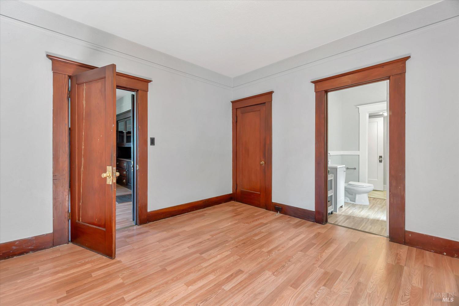 7 Bayview Street San Rafael, CA 94901 - Photo 25 of 79 an empty room with wooden floor and closet