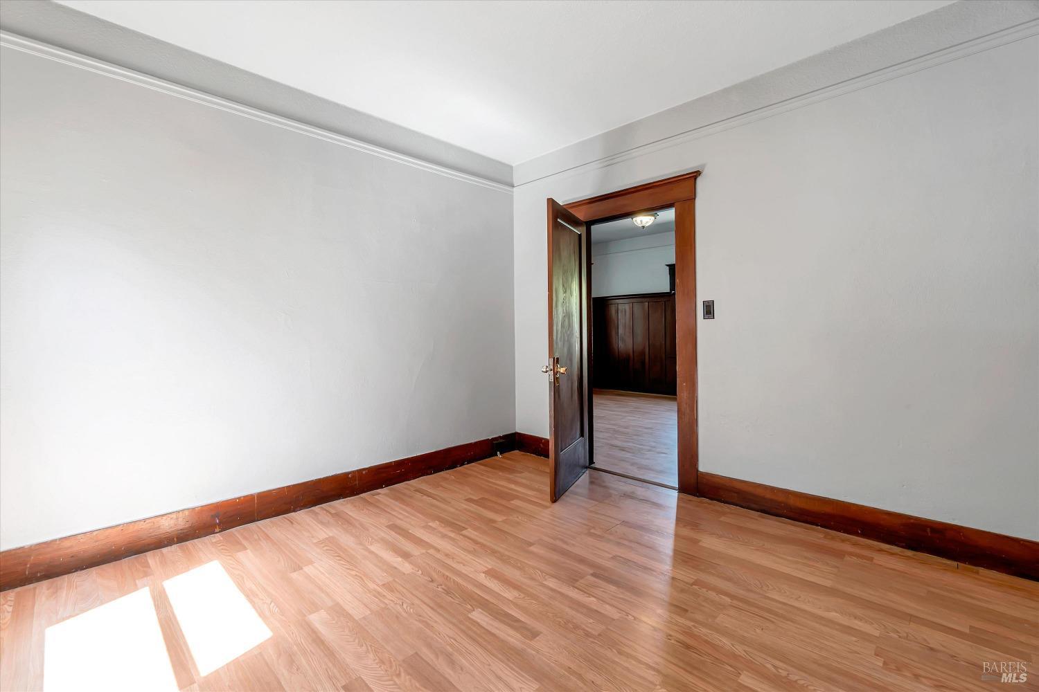 7 Bayview Street San Rafael, CA 94901 - Photo 27 of 79 a view of an empty room with wooden floor