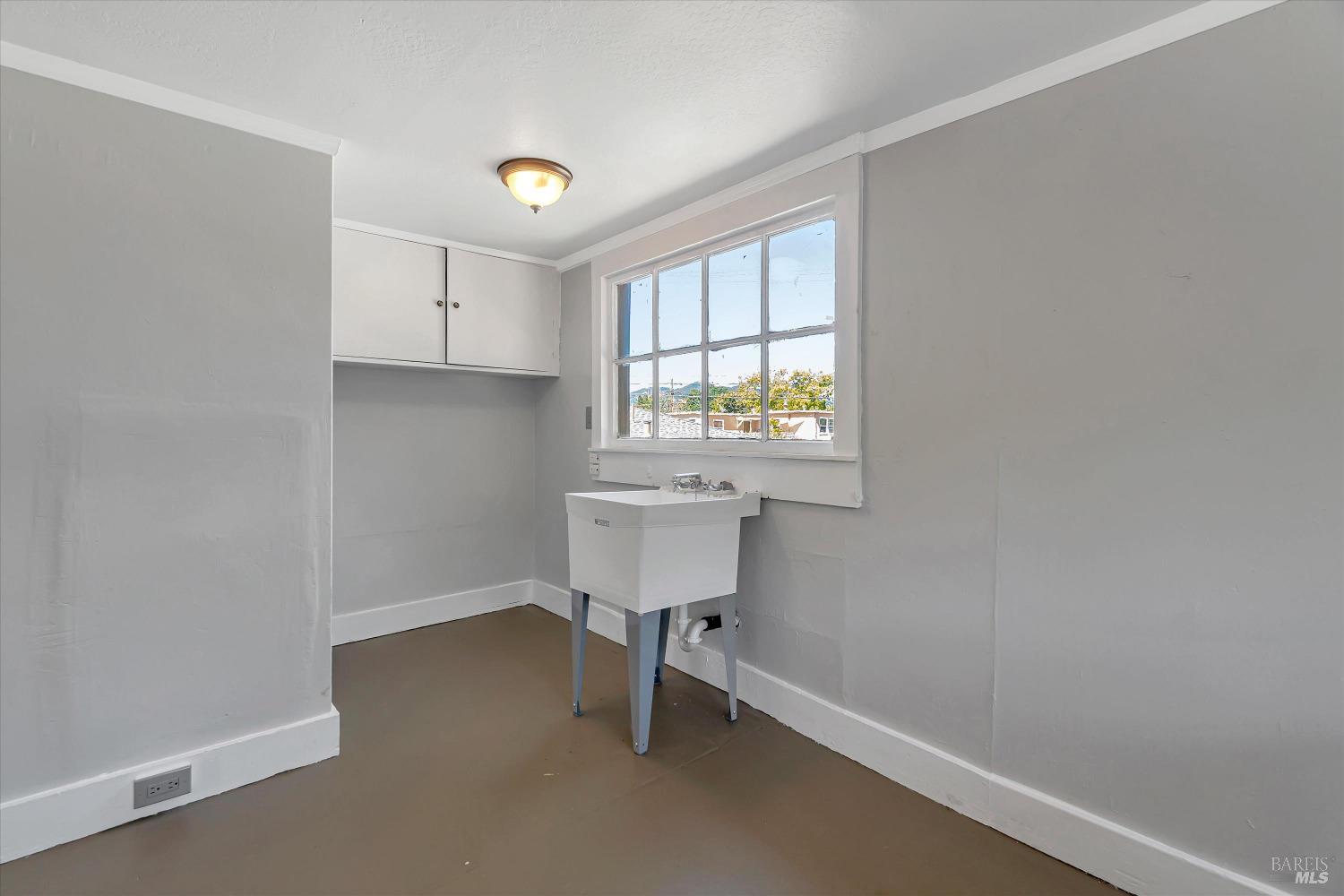 7 Bayview Street San Rafael, CA 94901 - Photo 30 of 79 a room with a window and a sink