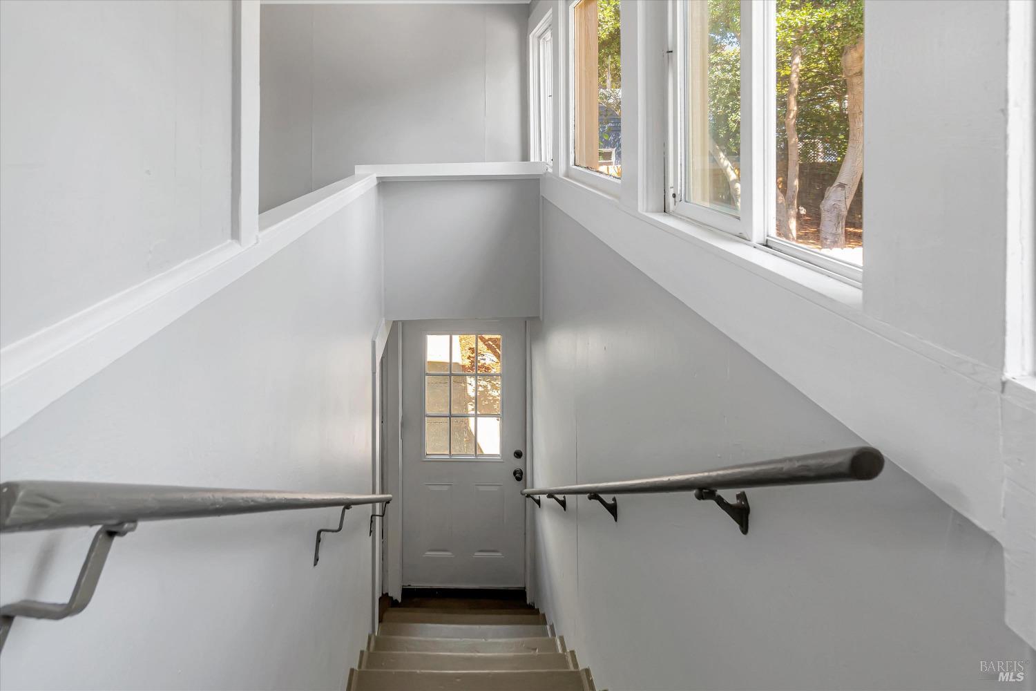 7 Bayview Street San Rafael, CA 94901 - Photo 39 of 79 a view of a room with rack on the wall and a window