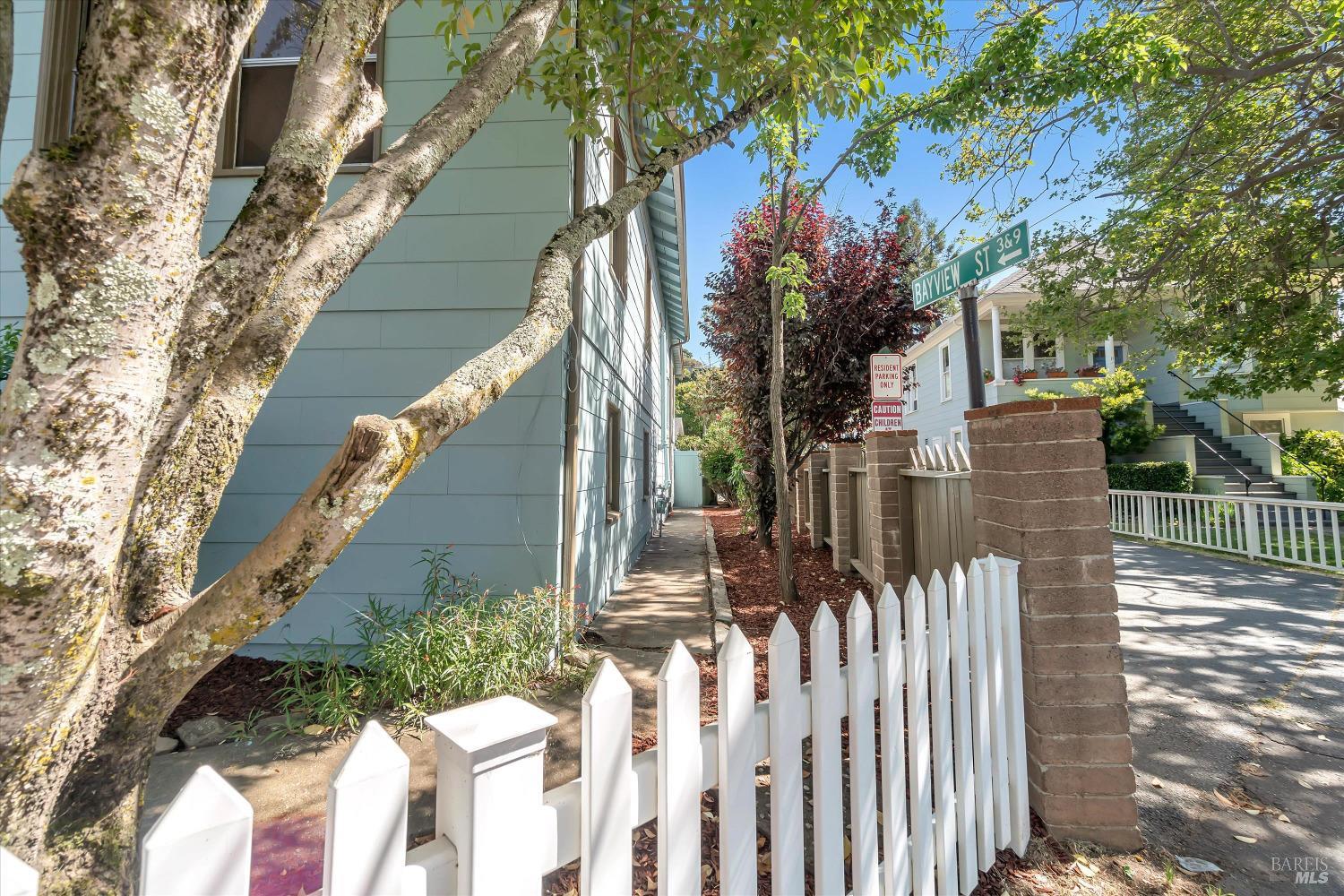7 Bayview Street San Rafael, CA 94901 - Photo 4 of 79 a view of a house with wooden fence