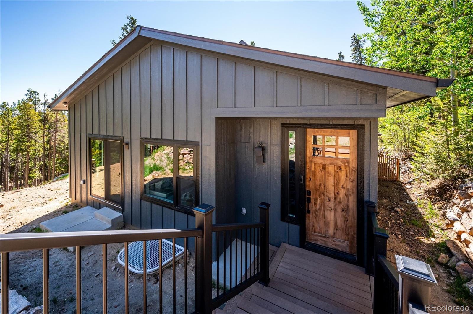 1633 Sinton Road Evergreen, CO 80439 - Photo 9 of 50 a view of a house from a balcony