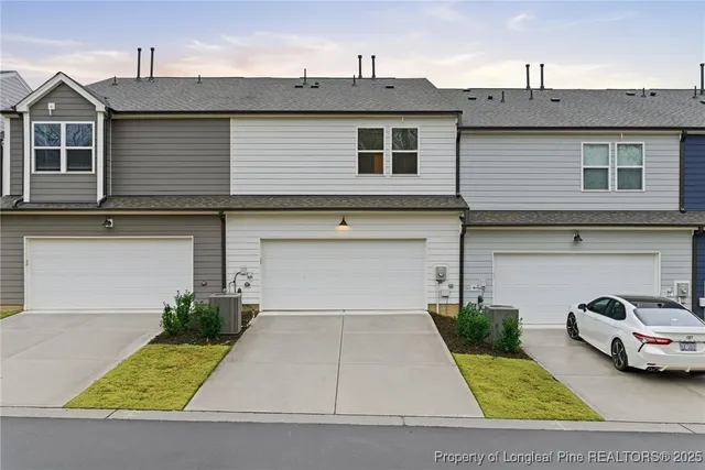 a car parked in front of a house