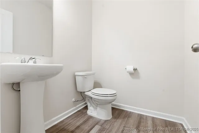 a view of a hallway with staircase