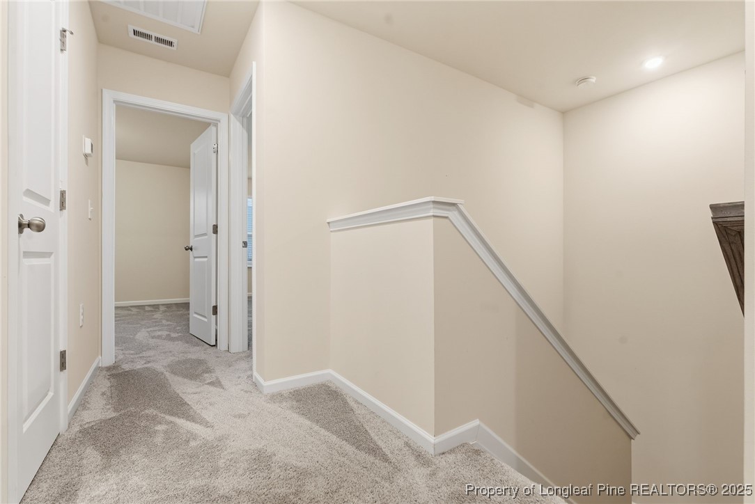 245 Ribbon Rail Street Fuquay-Varina, NC 27526 - Photo 24 of 43 a view of a hallway with closet and entryway
