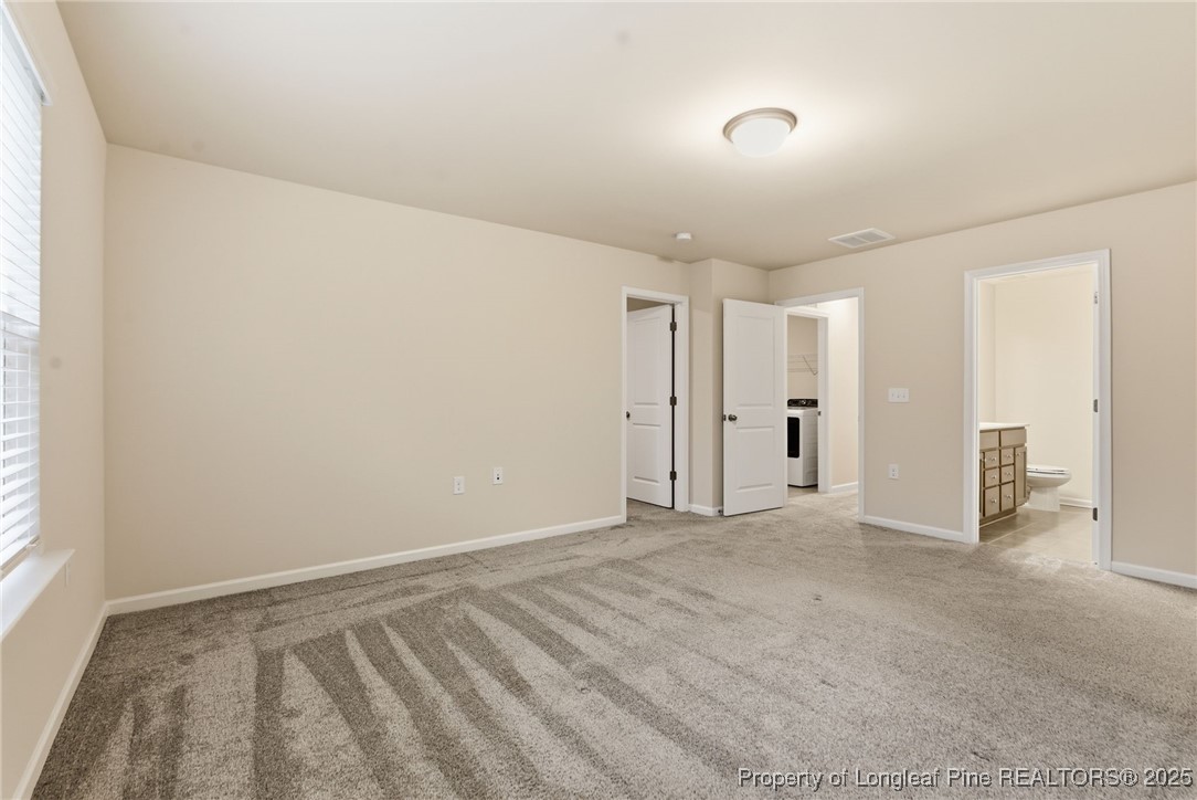245 Ribbon Rail Street Fuquay-Varina, NC 27526 - Photo 36 of 43 a view of an empty room