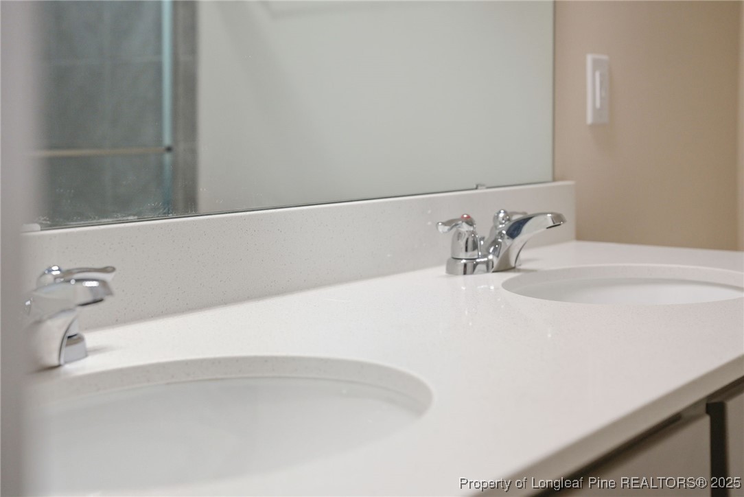 245 Ribbon Rail Street Fuquay-Varina, NC 27526 - Photo 39 of 43 a close up of a bathtub