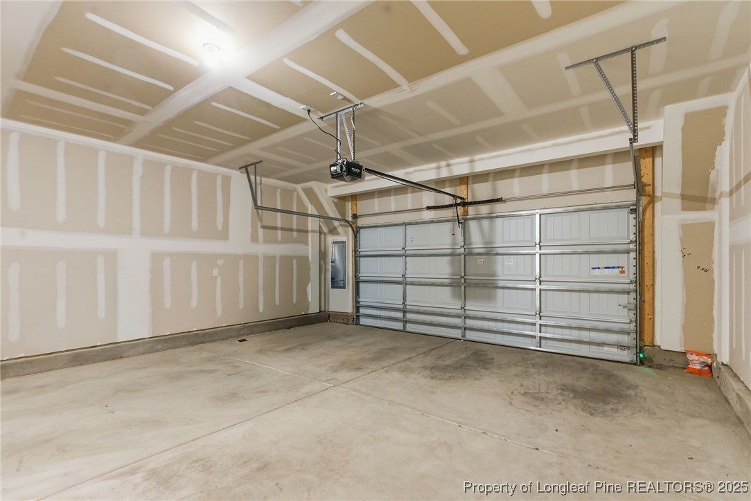 245 Ribbon Rail Street Fuquay-Varina, NC 27526 - Photo 41 of 43 a view of a garage