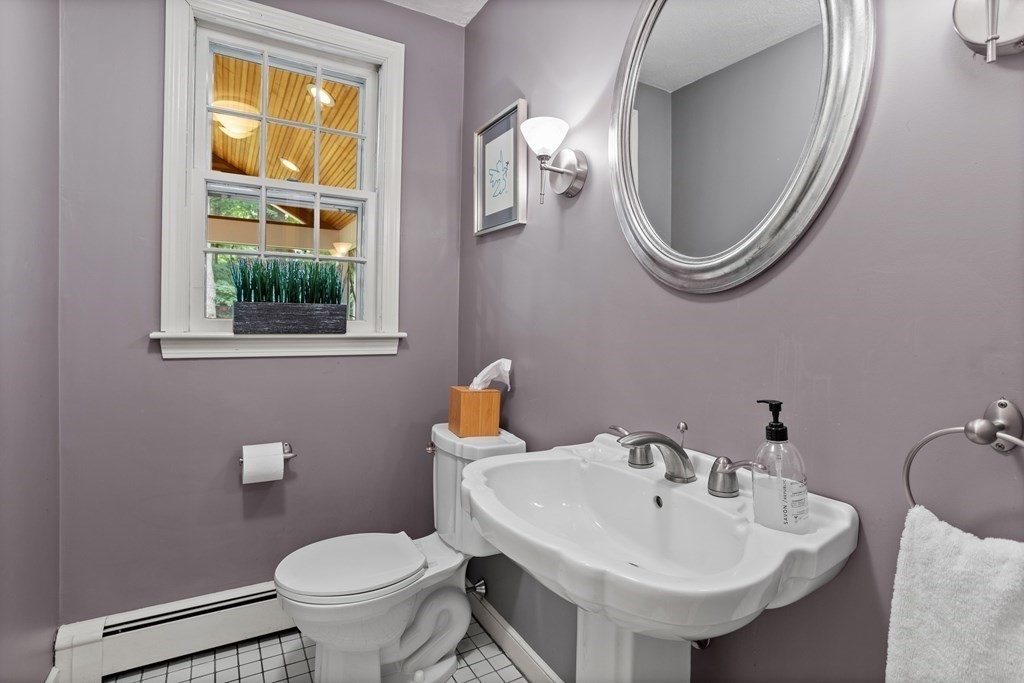 86 Pine Hill Road Boxborough, MA 01719 - Photo 16 of 42 a bathroom with a sink a toilet and a mirror