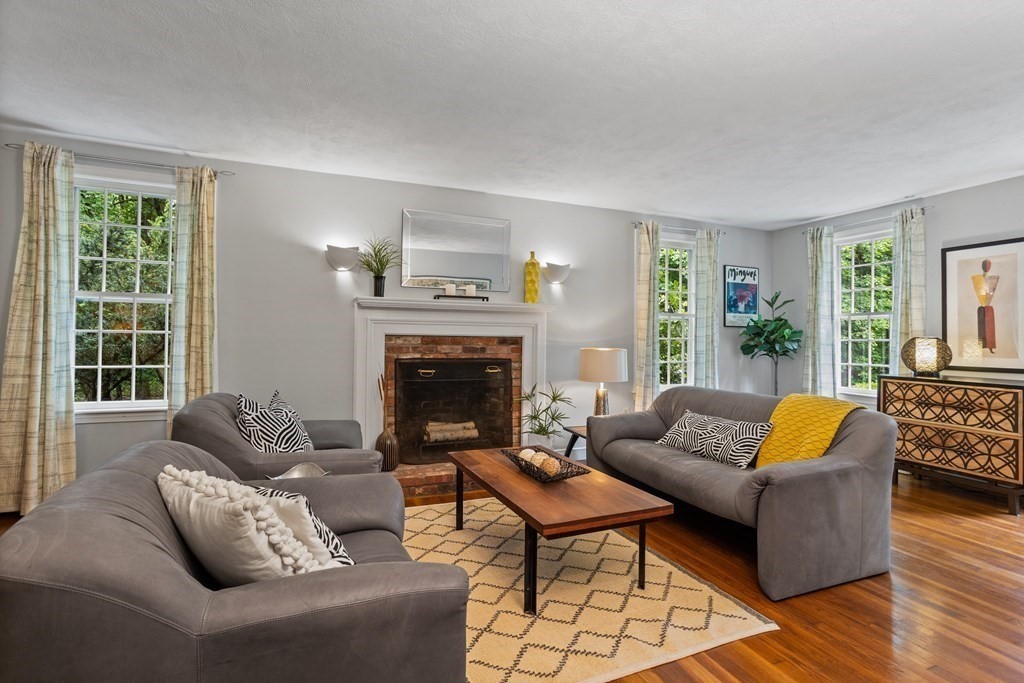 86 Pine Hill Road Boxborough, MA 01719 - Photo 17 of 42 a living room with furniture and a fireplace