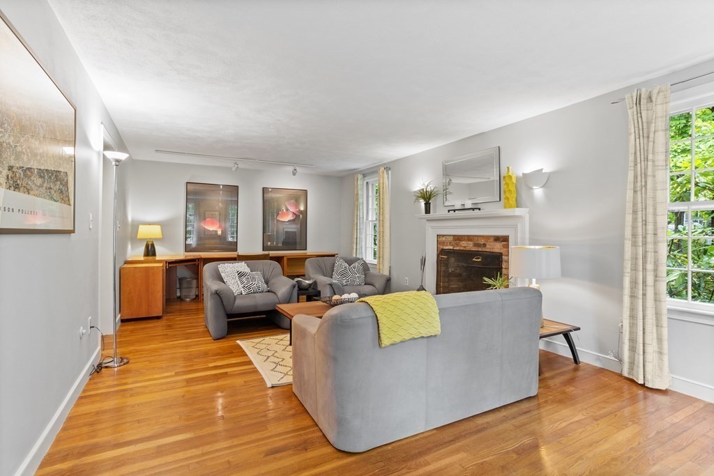 86 Pine Hill Road Boxborough, MA 01719 - Photo 18 of 42 a living room with furniture and a fireplace