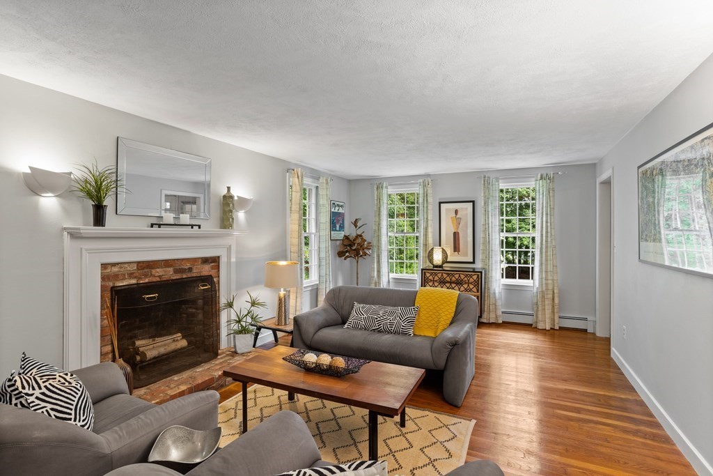86 Pine Hill Road Boxborough, MA 01719 - Photo 19 of 42 a living room with furniture and a fireplace