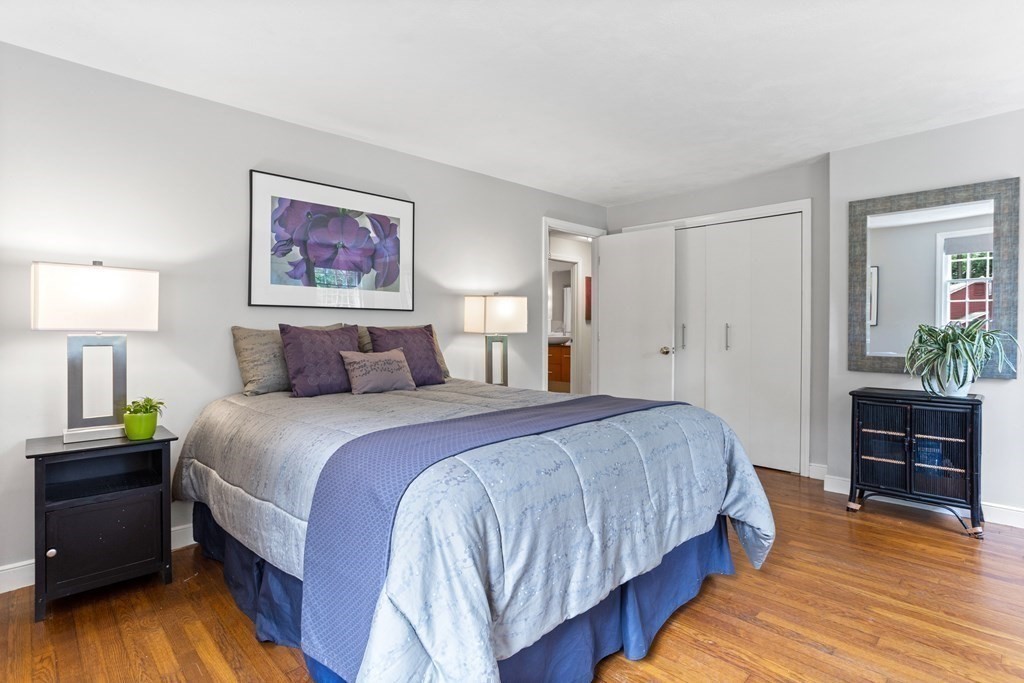 86 Pine Hill Road Boxborough, MA 01719 - Photo 20 of 42 a bedroom with bed and wooden floor