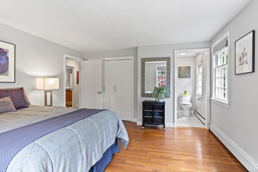 86 Pine Hill Road Boxborough, MA 01719 - Photo 23 of 42 a spacious bedroom with a bed and wooden floor