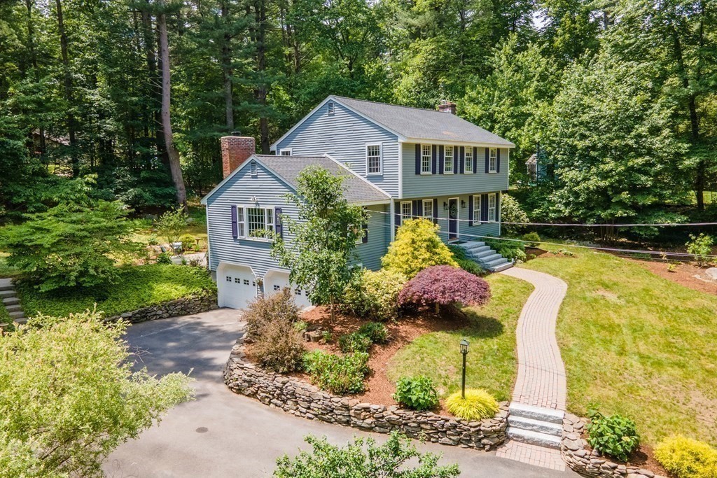 86 Pine Hill Road Boxborough, MA 01719 - Photo 31 of 42 a front view of a house with a yard