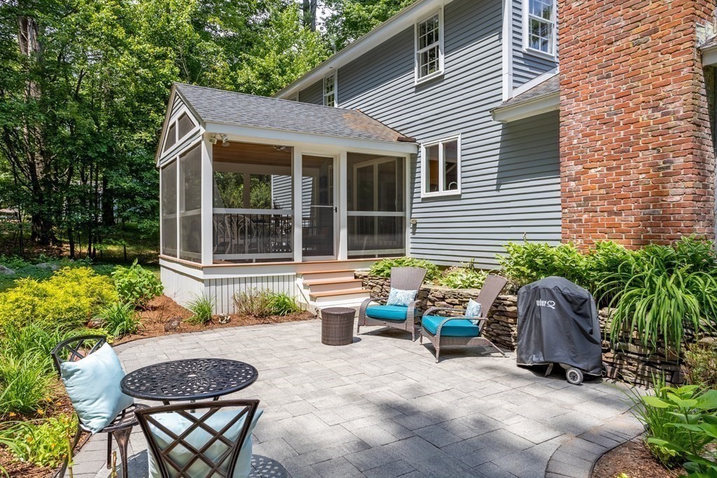 86 Pine Hill Road Boxborough, MA 01719 - Photo 33 of 42 a view of a house with backyard and sitting area