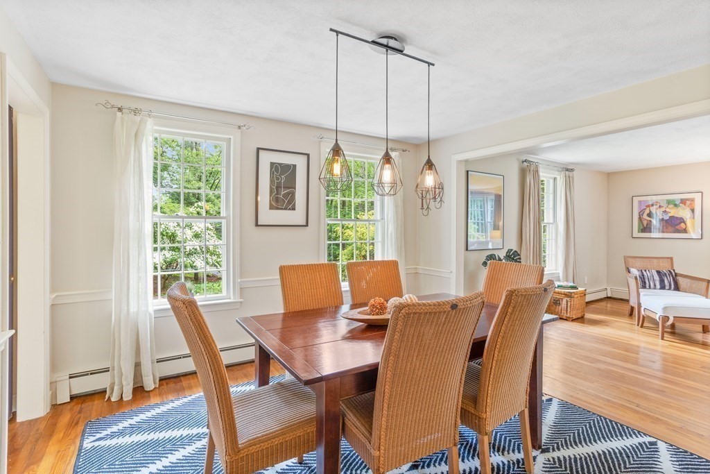 86 Pine Hill Road Boxborough, MA 01719 - Photo 7 of 42 a view of a dining room with furniture window and wooden floor