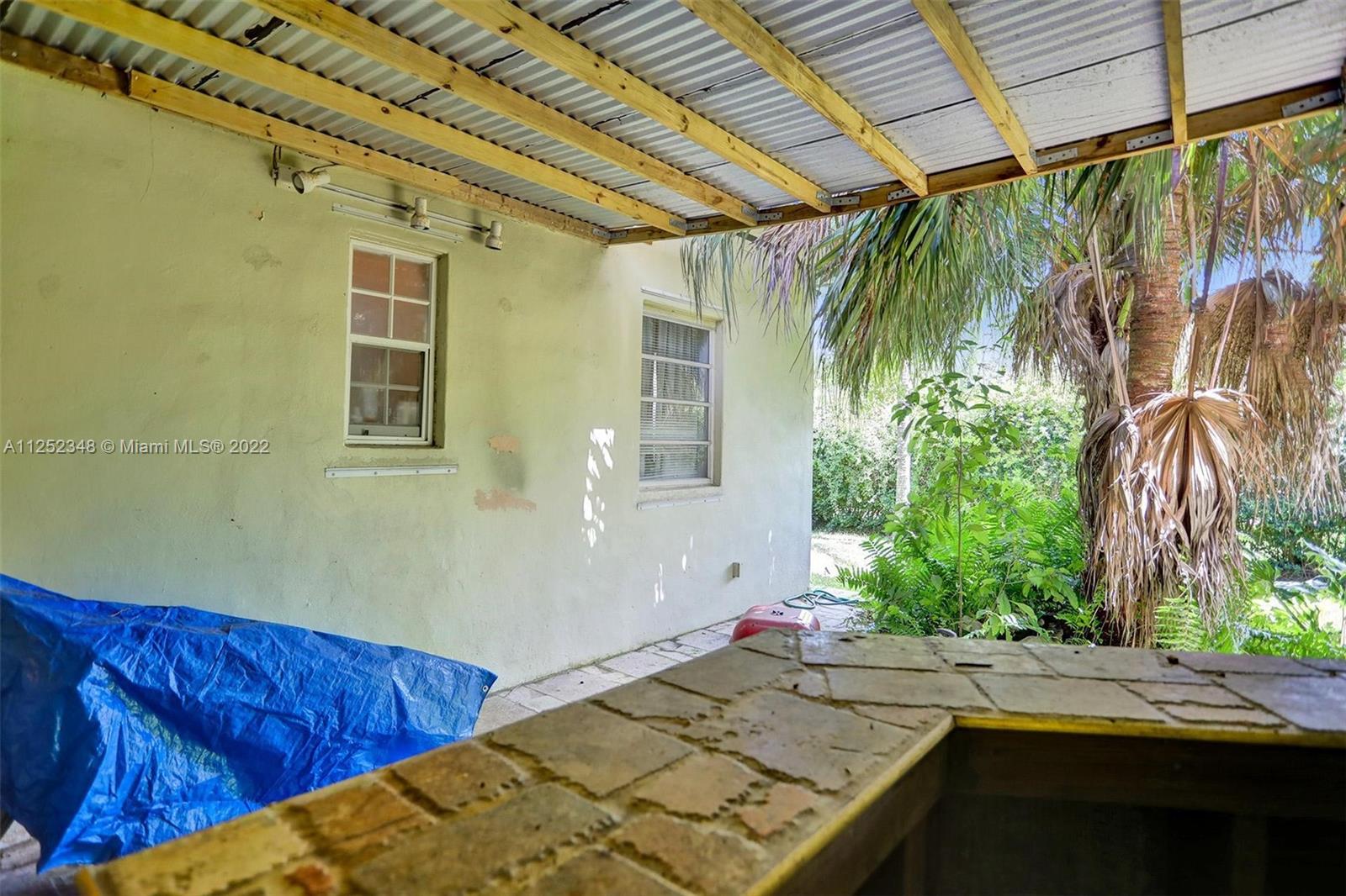 5930 Southwest 47th Street Miami, FL 33155 - Photo 12 of 43 a view of a backyard