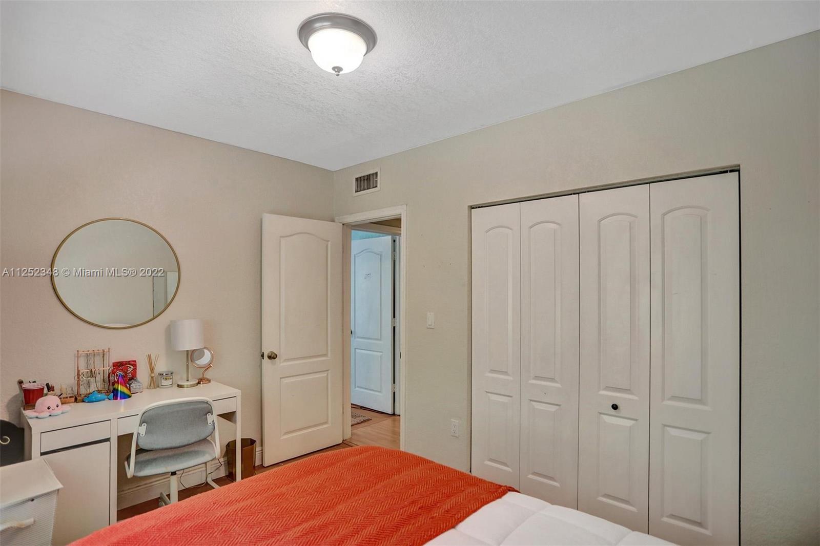 5930 Southwest 47th Street Miami, FL 33155 - Photo 23 of 43 a very nice looking room with a large mirror and a sink