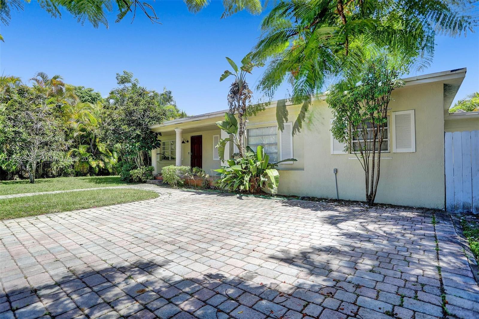 5930 Southwest 47th Street Miami, FL 33155 - Photo 3 of 43 a view of a house with backyard and a tree